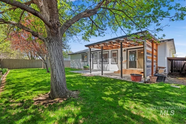 1600 Peregrine, Mountain Home, ID 83647 - back of property with a patio area and a pergola