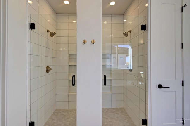 bathroom with an enclosed shower