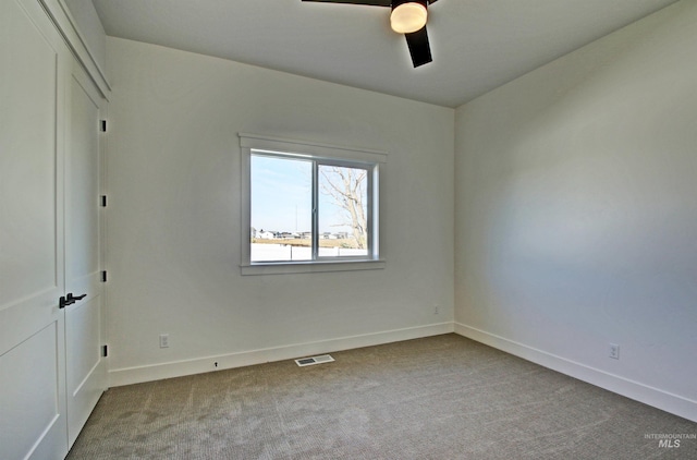 unfurnished bedroom with ceiling fan and light carpet