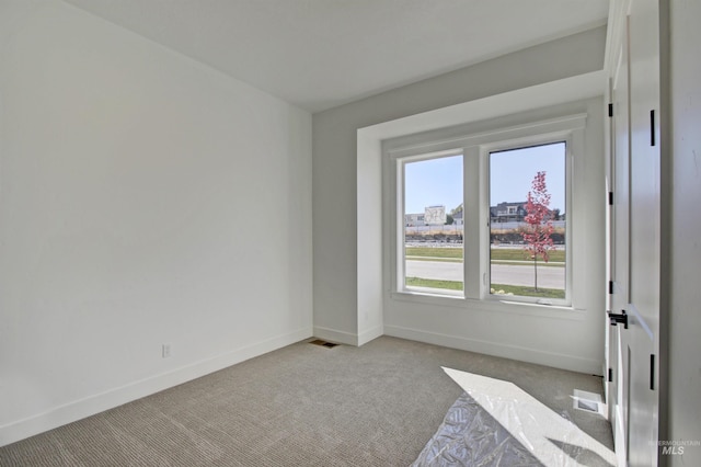 view of carpeted empty room