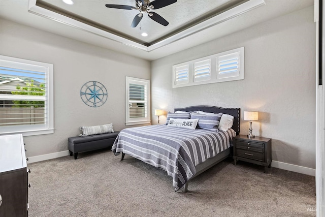 18279 N Tulip Ave, Nampa, ID 83687 - carpeted bedroom with a ceiling fan, baseboards, recessed lighting, and a tray ceiling
