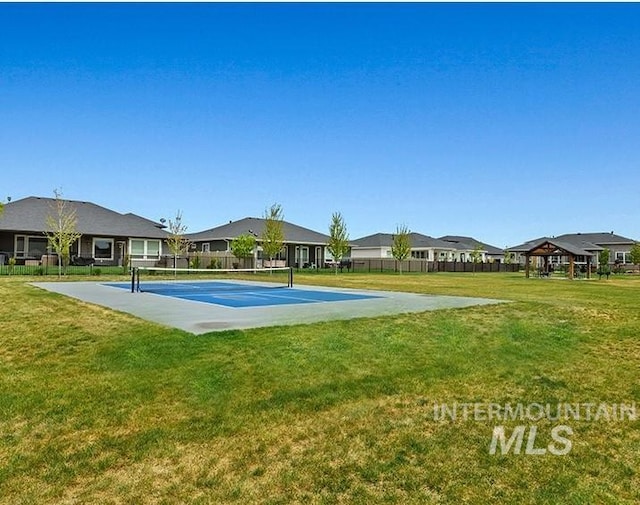 18279 N Tulip Ave, Nampa, ID 83687 - exterior space featuring fence, a yard, and a tennis court