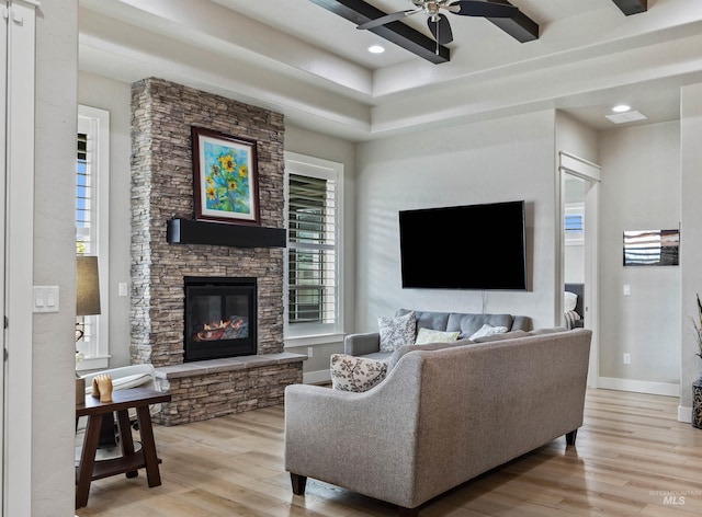 18279 N Tulip Ave, Nampa, ID 83687 - living area with ceiling fan, a fireplace, light wood-type flooring, baseboards, and recessed lighting