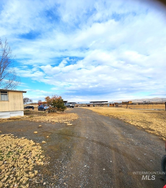 view of road featuring a rural view