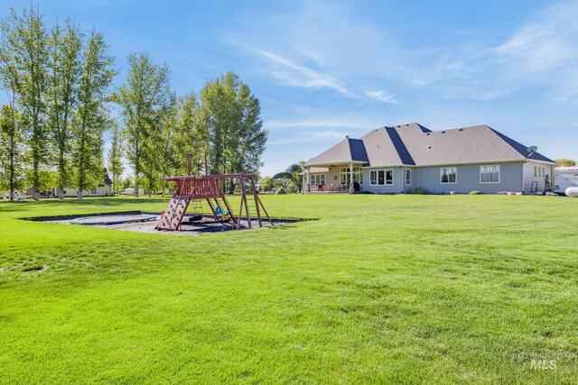 2466 Brooks Dr, Fruitland, ID 83619 - view of green lawn with a playground