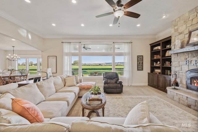 2466 Brooks Dr, Fruitland, ID 83619 - living area featuring ceiling fan, ornamental molding, recessed lighting, light carpet, and a chandelier