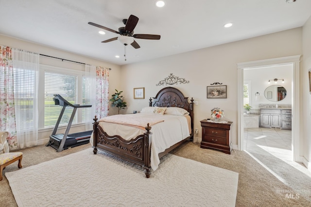 2466 Brooks Dr, Fruitland, ID 83619 - carpeted bedroom with baseboards, recessed lighting, ensuite bath, ceiling fan, and a sink