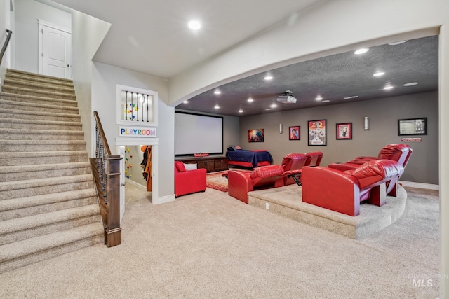 2466 Brooks Dr, Fruitland, ID 83619 - home theater room with carpet flooring, recessed lighting, arched walkways, and baseboards