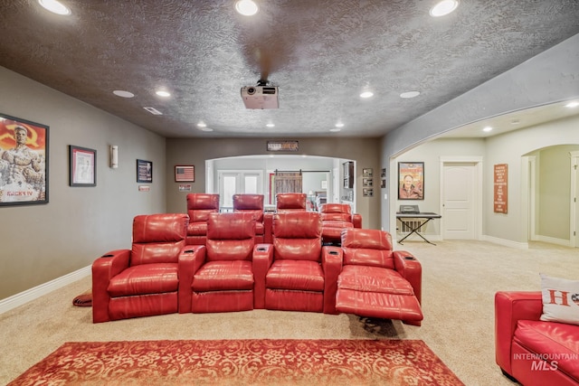 2466 Brooks Dr, Fruitland, ID 83619 - cinema with carpet, recessed lighting, arched walkways, and baseboards