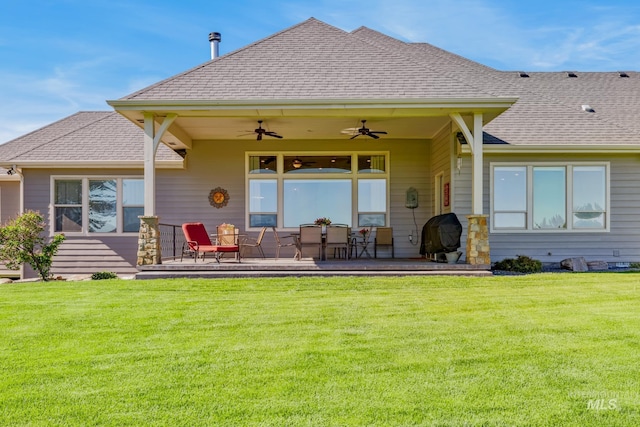 2466 Brooks Dr, Fruitland, ID 83619 - rear view of house featuring a ceiling fan, a lawn, and a shingled roof