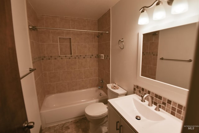 8395 W Golse Dr, Boise, ID 83704 - bathroom featuring vanity, toilet, decorative backsplash, and bathtub / shower combination