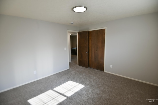 8395 W Golse Dr, Boise, ID 83704 - unfurnished bedroom featuring baseboards, a closet, and carpet