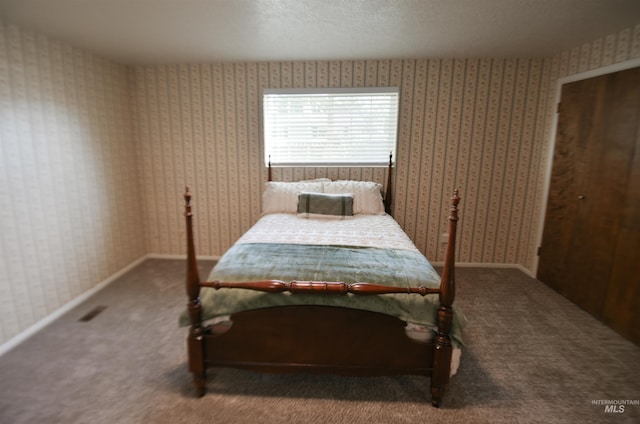 8395 W Golse Dr, Boise, ID 83704 - carpeted bedroom featuring wallpapered walls
