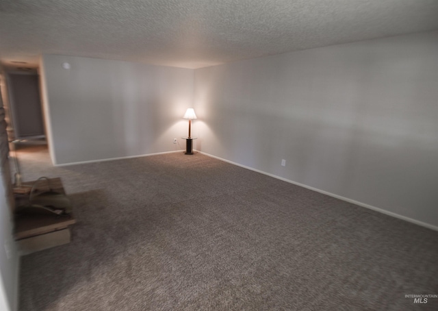 8395 W Golse Dr, Boise, ID 83704 - carpeted empty room featuring baseboards and a textured ceiling