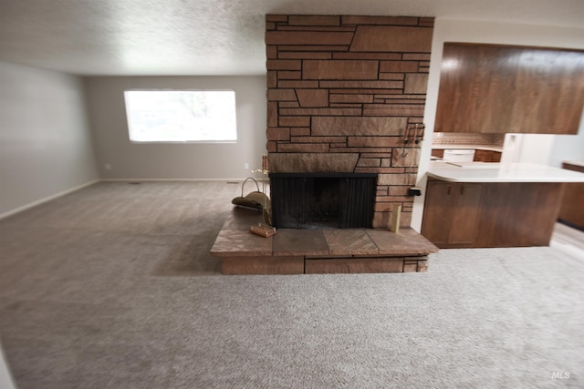 8395 W Golse Dr, Boise, ID 83704 - unfurnished living room with carpet, baseboards, and a stone fireplace