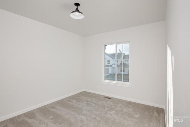 empty room with carpet floors