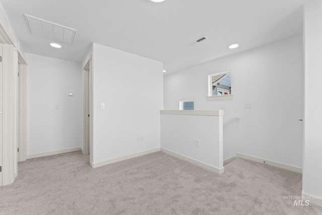 6303 W Stavros Dr, Meridian, ID 83646 - empty room featuring attic access, carpet flooring, recessed lighting, and baseboards