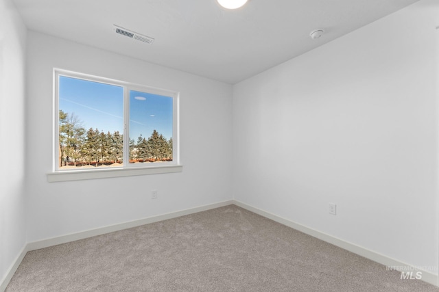 6303 W Stavros Dr, Meridian, ID 83646 - carpeted empty room with baseboards and a smoke detector