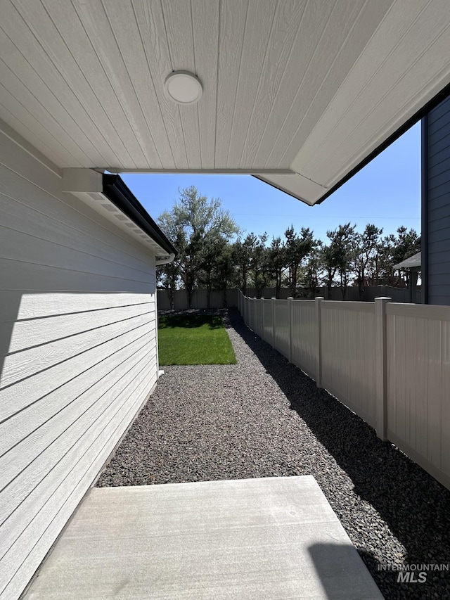 6303 W Stavros Dr, Meridian, ID 83646 - fenced backyard featuring a patio area