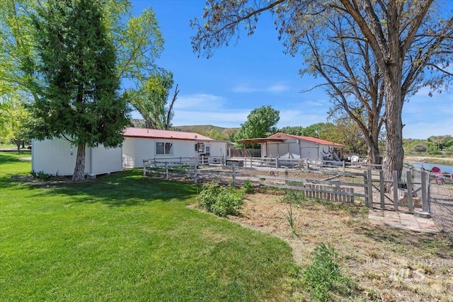 exterior space with fence and an outdoor structure