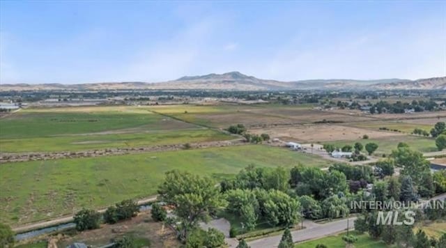 mountain view featuring a rural view