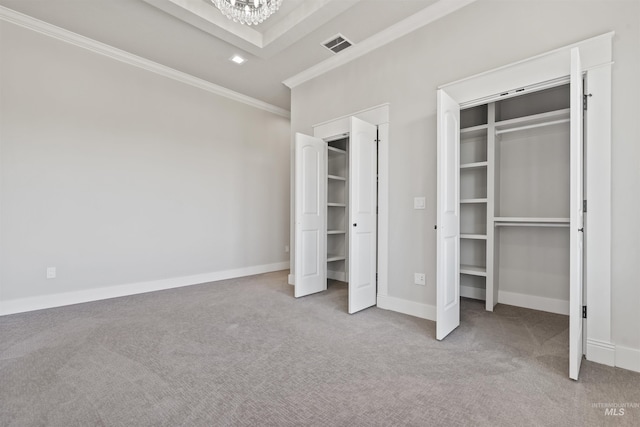 5990 W View Dr, Meridian, ID 83642 - unfurnished bedroom with crown molding, a chandelier, carpet flooring, multiple closets, and baseboards