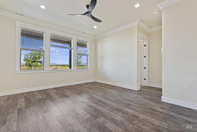 5990 W View Dr, Meridian, ID 83642 - spare room featuring crown molding, ceiling fan, dark wood-style floors, baseboards, and recessed lighting