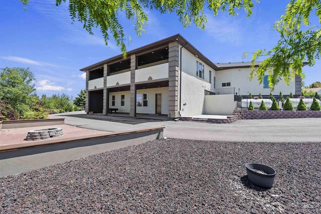 5990 W View Dr, Meridian, ID 83642 - view of building exterior with an outdoor fire pit