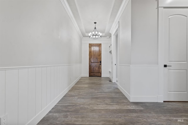 5990 W View Dr, Meridian, ID 83642 - hallway featuring a chandelier, wood finished floors, crown molding, and wainscoting