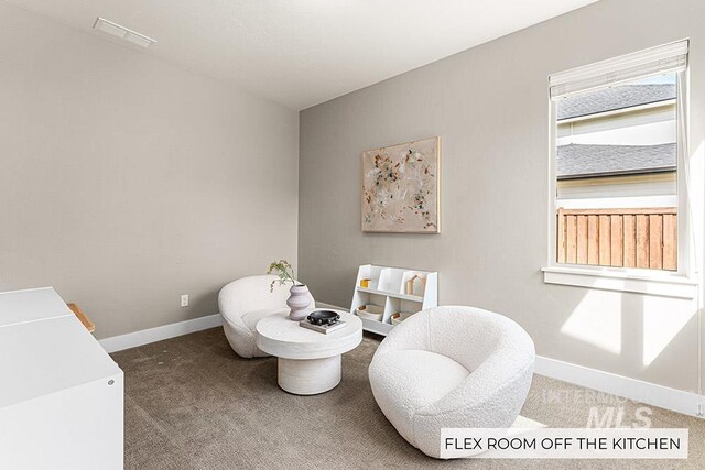 bathroom featuring baseboards and visible vents