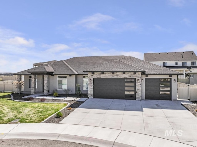 2252 Detweiler Pl, Twin Falls, ID 83301 - prairie-style house featuring fence, a garage, concrete driveway, a front yard, and roof with shingles