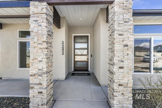2252 Detweiler Pl, Twin Falls, ID 83301 - entrance to property featuring stone siding and stucco siding
