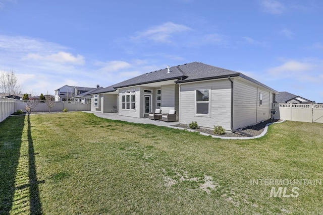 2252 Detweiler Pl, Twin Falls, ID 83301 - back of property with an outdoor living space, a patio area, roof with shingles, a fenced backyard, and a lawn