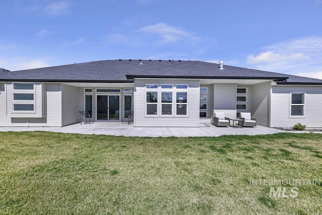 2252 Detweiler Pl, Twin Falls, ID 83301 - rear view of house with a shingled roof, a patio, and a yard