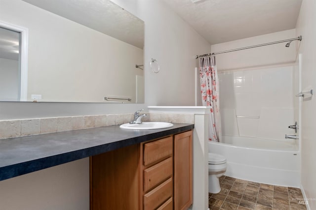 full bathroom with vanity, shower / bathtub combination with curtain, and toilet