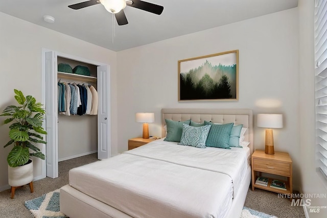 carpeted bedroom featuring ceiling fan and a closet