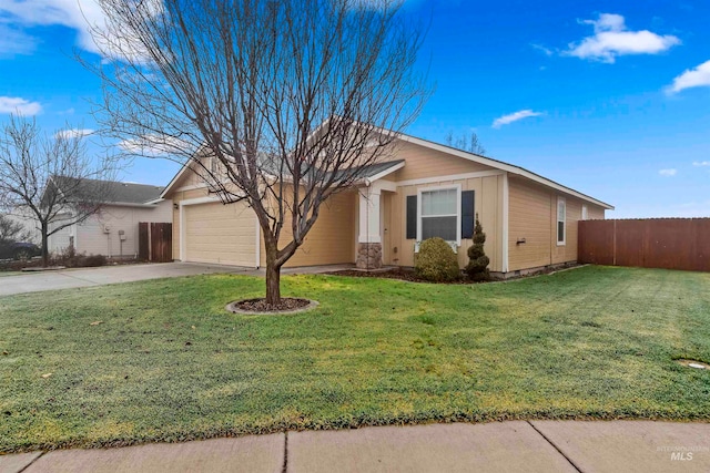 view of front of home with a garage and a front yard