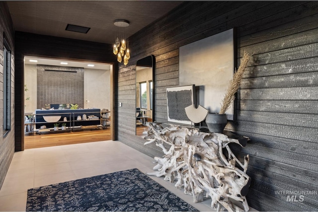 hallway with wooden walls