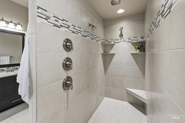 3924 E Forked Deer St, Boise, ID 83716 - bathroom featuring tiled shower, recessed lighting, vanity, and tile patterned flooring