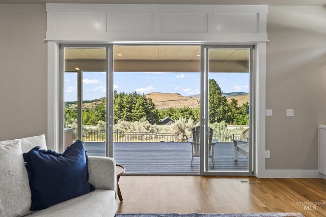3924 E Forked Deer St, Boise, ID 83716 - doorway featuring a mountain view and wood finished floors
