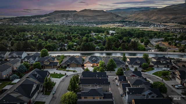3924 E Forked Deer St, Boise, ID 83716 - aerial view at dusk of a mountain view and a residential view