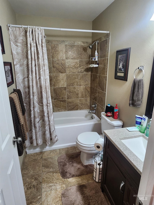 full bath featuring vanity, toilet, and shower / bathtub combination with curtain