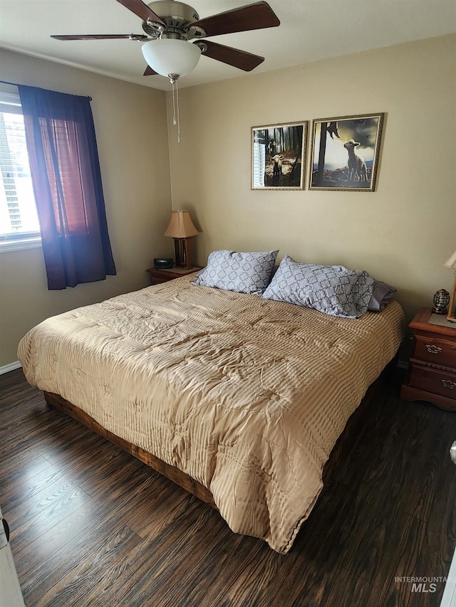 bedroom featuring ceiling fan and wood finished floors