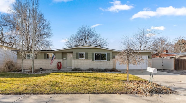 ranch-style house with a front yard and a garage