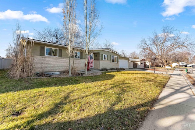 ranch-style house with a front yard and a garage