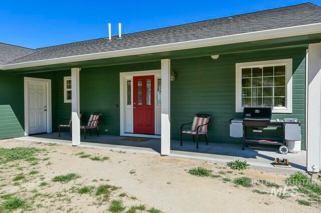 property entrance with a porch