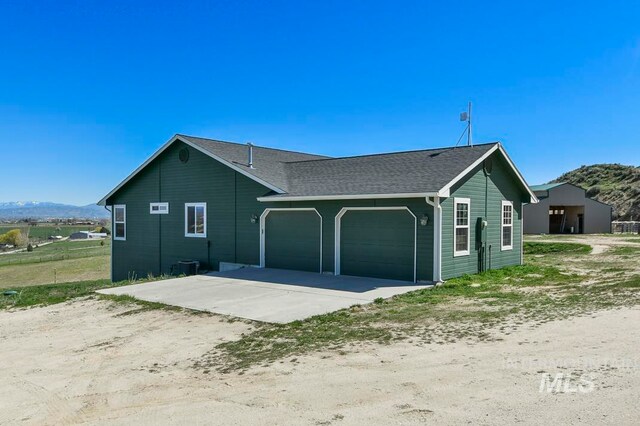 ranch-style home with a garage