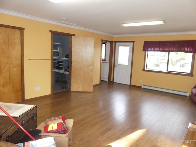 living room with dark hardwood / wood-style flooring, ornamental molding, and baseboard heating