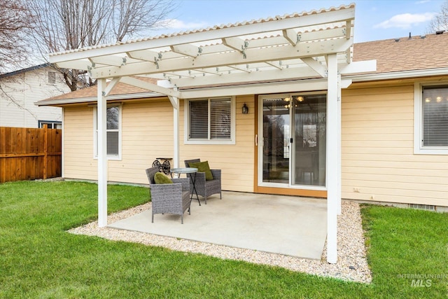 rear view of property with a patio, fence, a pergola, and a yard