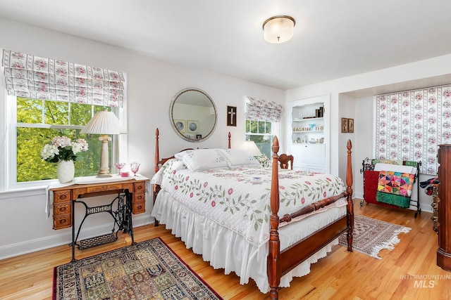 bedroom featuring wood-type flooring